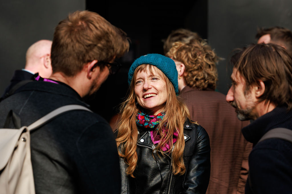 Attendees connecting at a WXO event